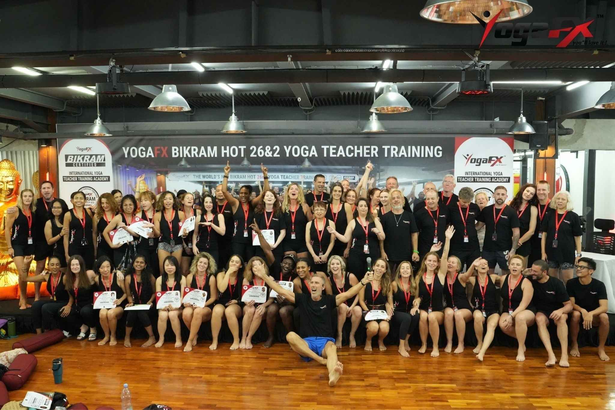 YogaFX Bikram Hot 26 and 2 teacher training graduates of different ages holding RYT 200 certificates with Mr. Ian Terry in Bali